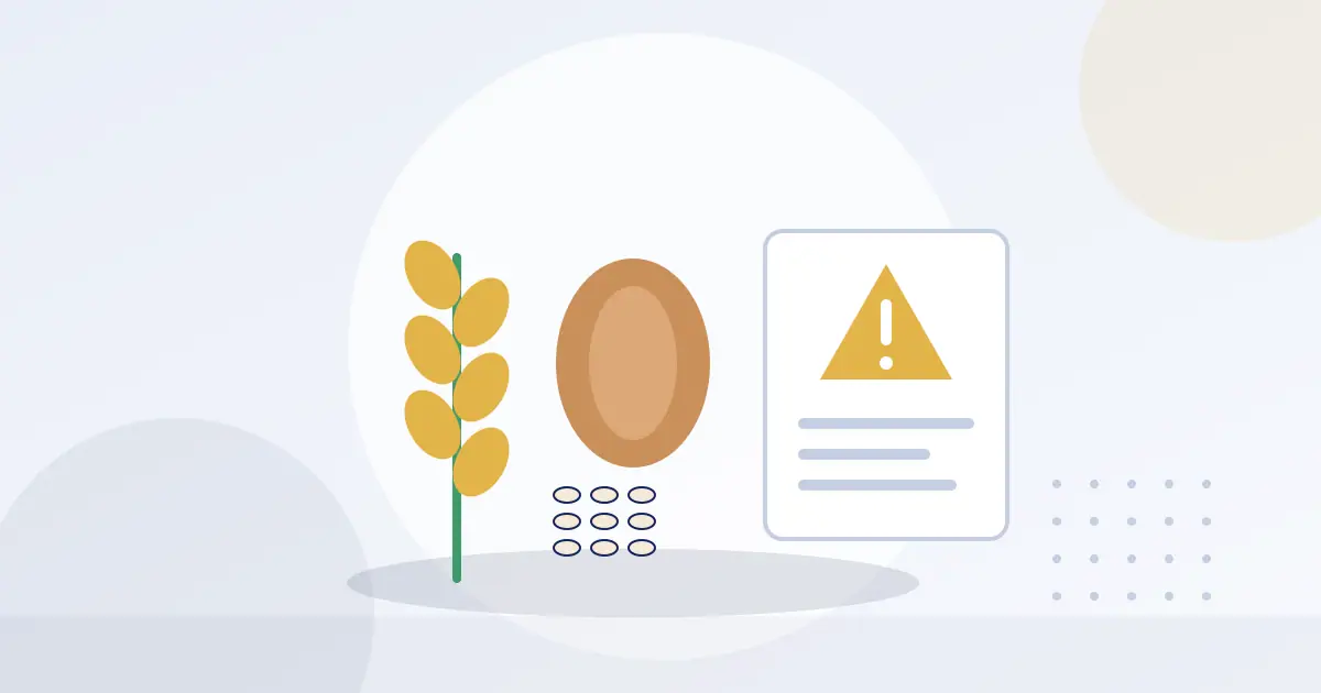 Illustration of wheat, a nut and seeds beside a label with a warning symbol